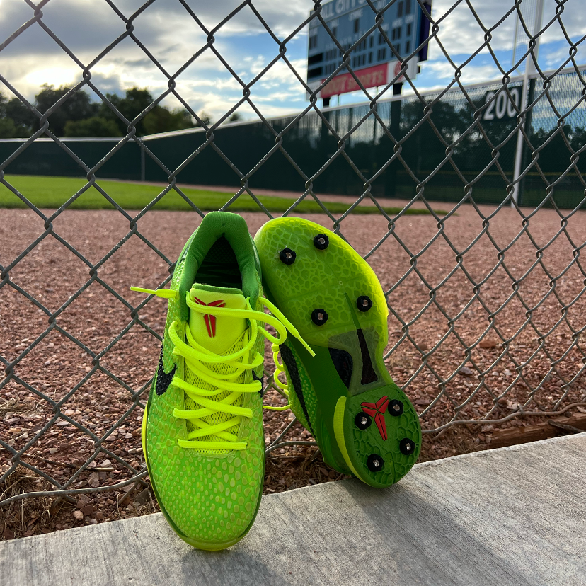 Lime Green baseball cleats with black Yardkick spikes